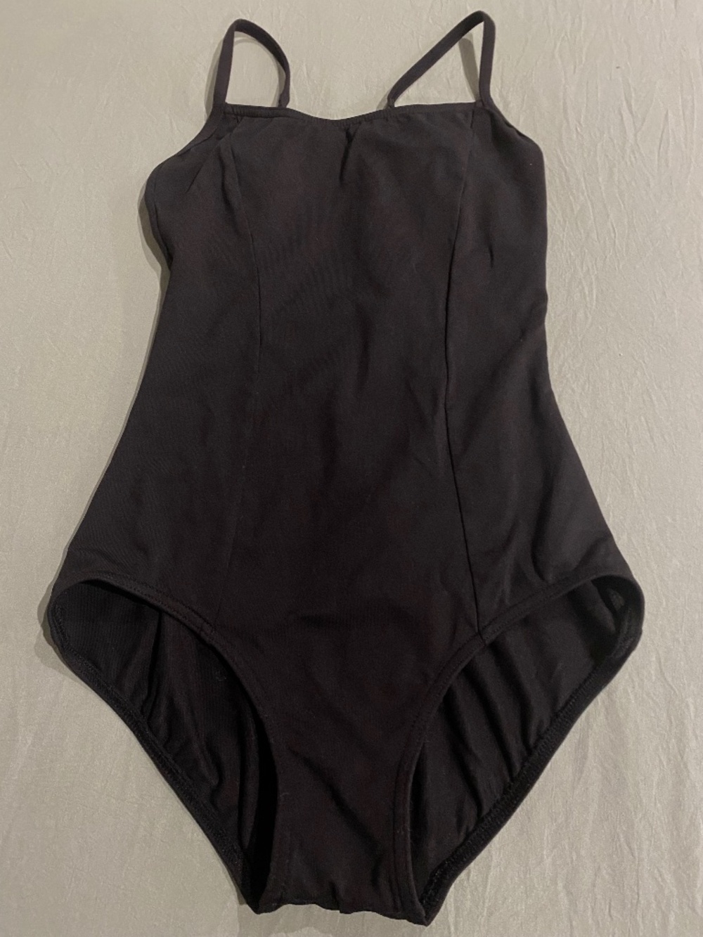 Black camisole leotard with strappy back
